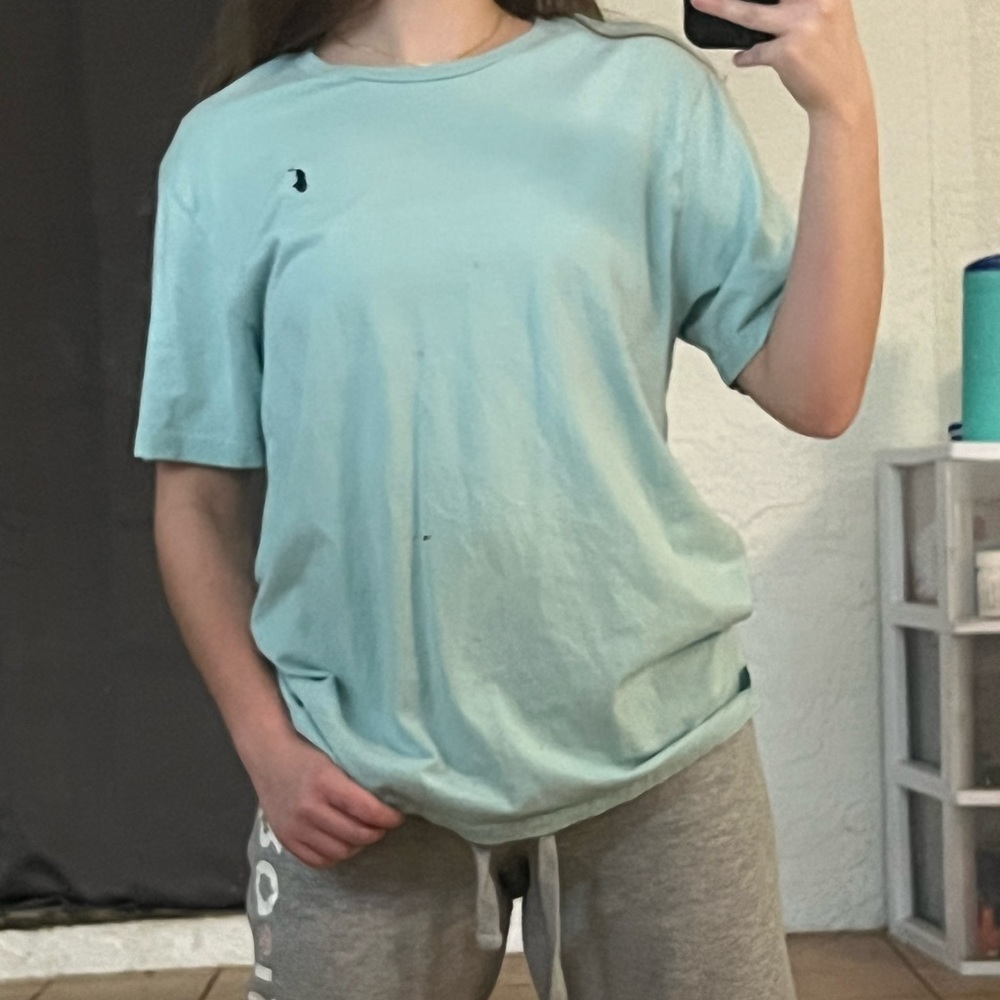blue polo shirt
